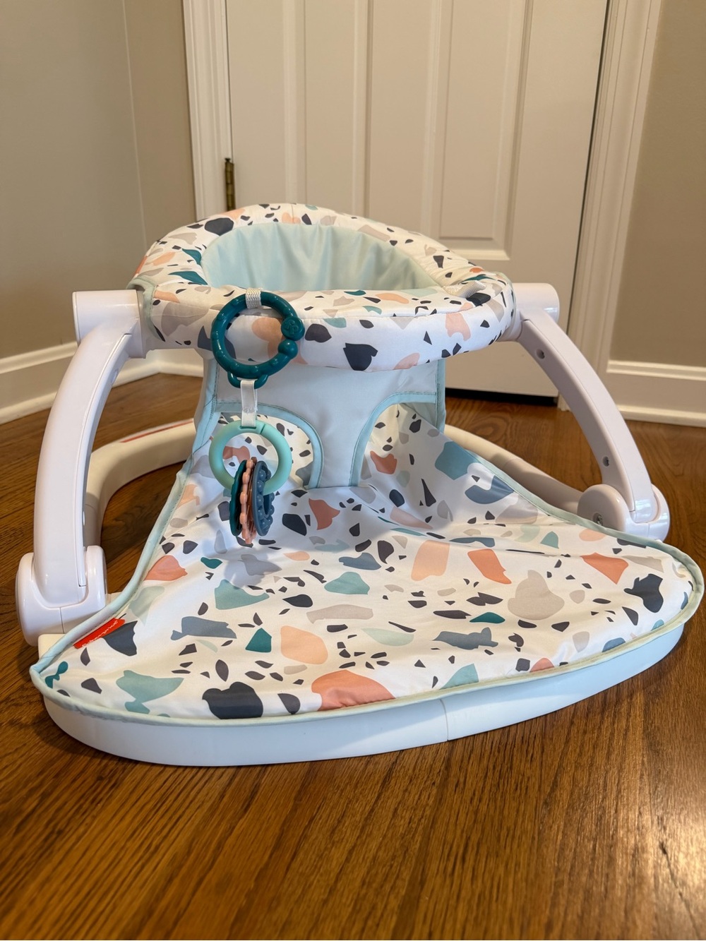 Fisher-Price Multi-Color Terrazzo Pattern Baby Seat with Teether Rings - Picture 2 of 6